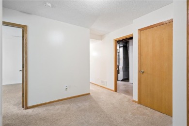 Great Townhome has good size front entry with closet and access on The Ponds Golf Club in Minnesota - for sale on GolfHomes.com, golf home, golf lot