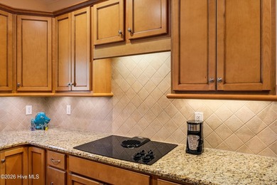 Bright & cheery end unit townhome with low maintenance brick on Cape Fear National At Brunswick Forest in North Carolina - for sale on GolfHomes.com, golf home, golf lot