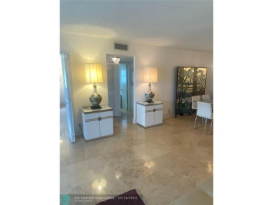 ARE YOU LOOKING FOR A PROPERTY VERY WELL MAINTAINED, SPACIOUS on Palm-Aire Country Club and Resort - Palms in Florida - for sale on GolfHomes.com, golf home, golf lot