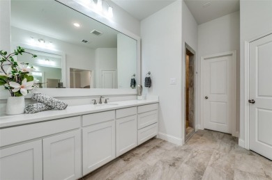 Welcome to this exquisite 4-bedroom provincial home, nestled in on The Tribute At the Colony in Texas - for sale on GolfHomes.com, golf home, golf lot