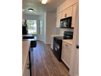 Charming Duplex in 55+ Community Where You Own the Land!  This on Tupelo Bay Golf Complex  in South Carolina - for sale on GolfHomes.com, golf home, golf lot