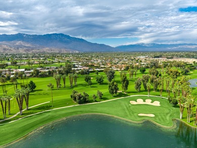 LOCATION & VIEWS. Be wowed in this stunning condo, where luxury on Desert Island Golf and Country Club in California - for sale on GolfHomes.com, golf home, golf lot