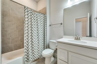 Welcome to this exquisite 4-bedroom provincial home, nestled in on The Tribute At the Colony in Texas - for sale on GolfHomes.com, golf home, golf lot
