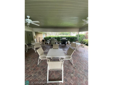 ARE YOU LOOKING FOR A PROPERTY VERY WELL MAINTAINED, SPACIOUS on Palm-Aire Country Club and Resort - Palms in Florida - for sale on GolfHomes.com, golf home, golf lot