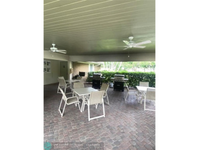 ARE YOU LOOKING FOR A PROPERTY VERY WELL MAINTAINED, SPACIOUS on Palm-Aire Country Club and Resort - Palms in Florida - for sale on GolfHomes.com, golf home, golf lot