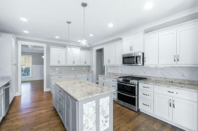 Welcome to Hampton Creek! This cozy Energy Right home is built on The Champions Club At Hampton Creek in Tennessee - for sale on GolfHomes.com, golf home, golf lot