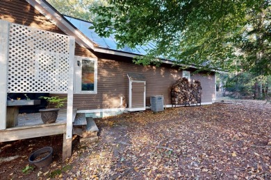 Welcome to 3 Fairway Drive in Grantham's Eastman community -- a on Eastman Golf Links in New Hampshire - for sale on GolfHomes.com, golf home, golf lot