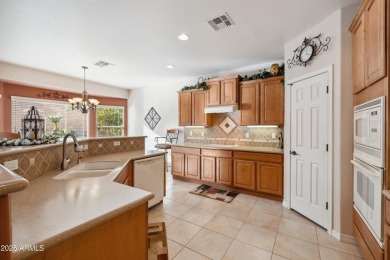 Welcome to your dream home! Nestled in the sought-after gated on The Golf Club At Johnson Ranch in Arizona - for sale on GolfHomes.com, golf home, golf lot