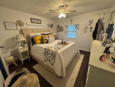 This 2-bedroom, 2-bath home has been remodeled in the last year on Grasslands Golf and Country Club in Florida - for sale on GolfHomes.com, golf home, golf lot