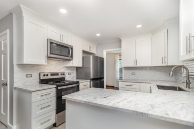 Beautifully updated 4-level split in Oak Meadows offering nearly on St. Andrews Golf and Country Club in Illinois - for sale on GolfHomes.com, golf home, golf lot