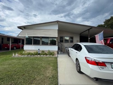 This 2-bedroom, 2-bath home has been remodeled in the last year on Grasslands Golf and Country Club in Florida - for sale on GolfHomes.com, golf home, golf lot