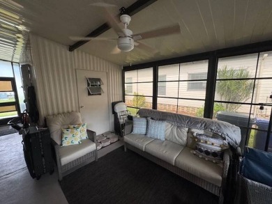This 2-bedroom, 2-bath home has been remodeled in the last year on Grasslands Golf and Country Club in Florida - for sale on GolfHomes.com, golf home, golf lot