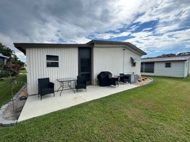 This 2-bedroom, 2-bath home has been remodeled in the last year on Grasslands Golf and Country Club in Florida - for sale on GolfHomes.com, golf home, golf lot