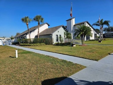 This 2-bedroom, 2-bath home has been remodeled in the last year on Grasslands Golf and Country Club in Florida - for sale on GolfHomes.com, golf home, golf lot