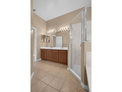 Welcome to 9650 Bay Pine Lane, a single-story, 4 bedroom/2 bath on North Shore Golf Club in Florida - for sale on GolfHomes.com, golf home, golf lot