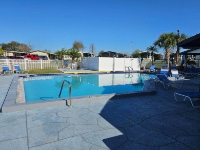 This 2-bedroom, 2-bath home has been remodeled in the last year on Grasslands Golf and Country Club in Florida - for sale on GolfHomes.com, golf home, golf lot