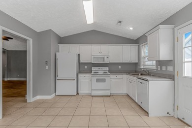 Welcome to this beautifully updated single-story ranch home in on Long Bay Club in South Carolina - for sale on GolfHomes.com, golf home, golf lot