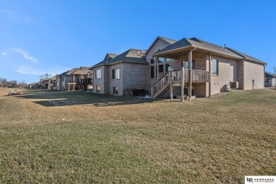 Welcome all to this luxurious brick townhome, situated on a on Wilderness Ridge Golf Club in Nebraska - for sale on GolfHomes.com, golf home, golf lot