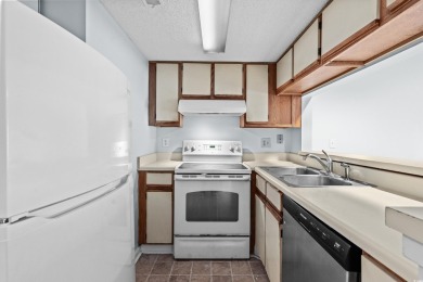 This North Myrtle Beach condo is a perfect beachside retreat on Possum Trot Golf Course in South Carolina - for sale on GolfHomes.com, golf home, golf lot