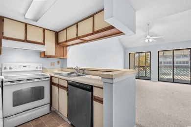 This North Myrtle Beach condo is a perfect beachside retreat on Possum Trot Golf Course in South Carolina - for sale on GolfHomes.com, golf home, golf lot