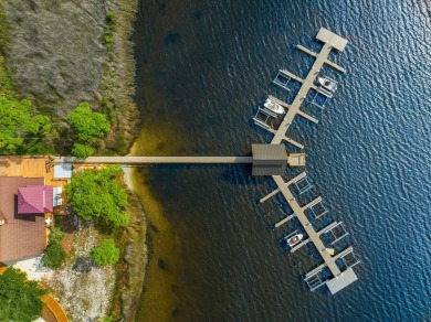 This .55-acre vacant lot is located in the gated Wild Heron on Sharks Tooth Golf Club in Florida - for sale on GolfHomes.com, golf home, golf lot