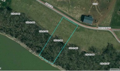 We are pleased to present 2 beautiful LAKEFRONT buildable lots on Peninsula Golf Resort in Kentucky - for sale on GolfHomes.com, golf home, golf lot