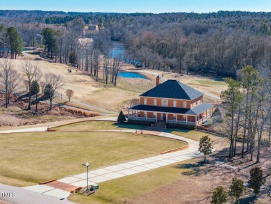 Welcome to an exquisite estate that epitomizes elegance and on Riverwood Golf and Athletic Club in North Carolina - for sale on GolfHomes.com, golf home, golf lot