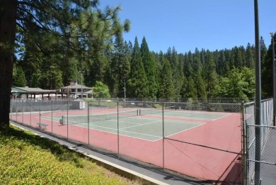 This home offers an unbeatable location directly across from the on Sequoia Woods Country Club in California - for sale on GolfHomes.com, golf home, golf lot
