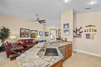 Golf membership included with purchase. This 2nd floor end unit on Pelican Sound Golf and River Club in Florida - for sale on GolfHomes.com, golf home, golf lot