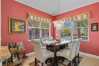 Golf membership included with purchase. This 2nd floor end unit on Pelican Sound Golf and River Club in Florida - for sale on GolfHomes.com, golf home, golf lot