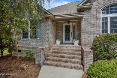 Nestled along the fairway in the gated, amenity-rich community on Harbour Point Golf Club in North Carolina - for sale on GolfHomes.com, golf home, golf lot