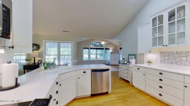 Nestled along the fairway in the gated, amenity-rich community on Harbour Point Golf Club in North Carolina - for sale on GolfHomes.com, golf home, golf lot