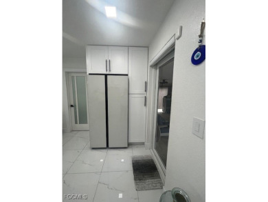 Welcome to your Dream Home! Fully remodeled in 2022, this home on Trump International Golf Club West Palm Beach in Florida - for sale on GolfHomes.com, golf home, golf lot