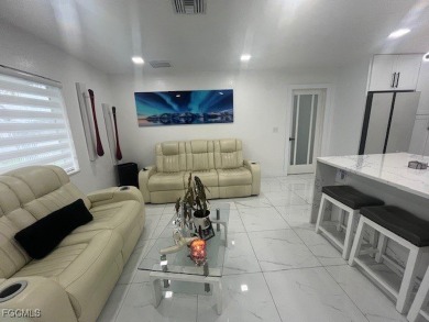 Welcome to your Dream Home! Fully remodeled in 2022, this home on Trump International Golf Club West Palm Beach in Florida - for sale on GolfHomes.com, golf home, golf lot