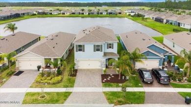 LAKEFRONT 5-bedroom, 3-bathroom, 2-car garage, concrete block on Venetian Bay Golf Course in Florida - for sale on GolfHomes.com, golf home, golf lot