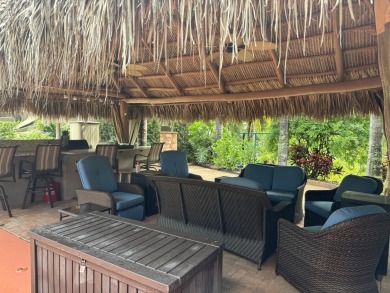 Beautiful landscaped . Large granite bar for wonderful outdoor on St. Lucie Trail Golf Club in Florida - for sale on GolfHomes.com, golf home, golf lot