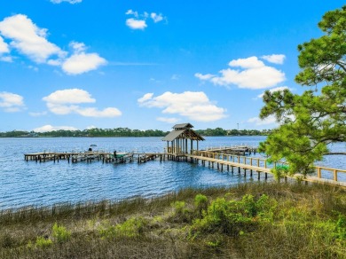 This .5-acre vacant lot is located in the gated Wild Heron on Sharks Tooth Golf Club in Florida - for sale on GolfHomes.com, golf home, golf lot