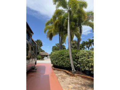 Beautiful landscaped . Large granite bar for wonderful outdoor on St. Lucie Trail Golf Club in Florida - for sale on GolfHomes.com, golf home, golf lot