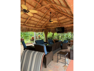 Beautiful landscaped . Large granite bar for wonderful outdoor on St. Lucie Trail Golf Club in Florida - for sale on GolfHomes.com, golf home, golf lot