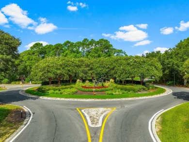 This .5-acre vacant lot is located in the gated Wild Heron on Sharks Tooth Golf Club in Florida - for sale on GolfHomes.com, golf home, golf lot