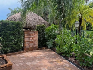 Beautiful landscaped . Large granite bar for wonderful outdoor on St. Lucie Trail Golf Club in Florida - for sale on GolfHomes.com, golf home, golf lot