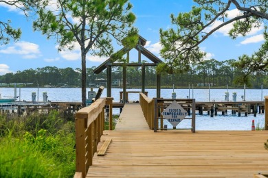 This .5-acre vacant lot is located in the gated Wild Heron on Sharks Tooth Golf Club in Florida - for sale on GolfHomes.com, golf home, golf lot