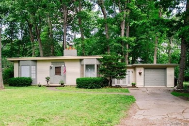 What an amazing opportunity to own an affordable home in on Edgewood Country Club in Michigan - for sale on GolfHomes.com, golf home, golf lot