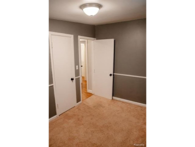 What an amazing opportunity to own an affordable home in on Edgewood Country Club in Michigan - for sale on GolfHomes.com, golf home, golf lot
