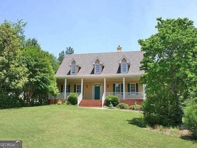 Charming 5 bedroom/4.5 bath Cape Cod-style home in Snellville's on Country Club of Gwinnett in Georgia - for sale on GolfHomes.com, golf home, golf lot