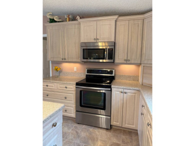 This lovely, TURNKEY manufactured 2 bdr, 2bath home located on a on Pine Lakes Country Club in Florida - for sale on GolfHomes.com, golf home, golf lot