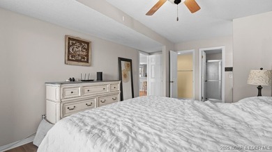 Welcome home to the Osage Vista's community. This top floor unit on Seasons Ridge At Four Seasons in Missouri - for sale on GolfHomes.com, golf home, golf lot