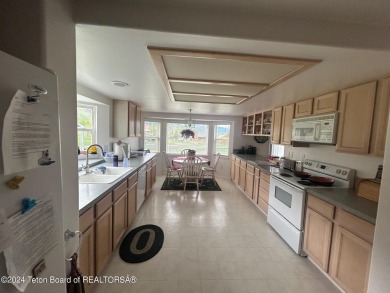 Beautifully landscaped, one-level Golf Course Home in Star on Cedar Creek Golf Course in Wyoming - for sale on GolfHomes.com, golf home, golf lot