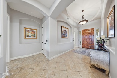 Experience elevated desert living in this exceptional TW Lewis on Estrella Mountain Ranch Golf Course in Arizona - for sale on GolfHomes.com, golf home, golf lot