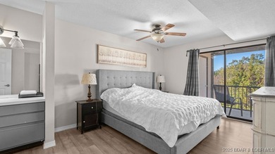 Welcome home to the Osage Vista's community. This top floor unit on Seasons Ridge At Four Seasons in Missouri - for sale on GolfHomes.com, golf home, golf lot